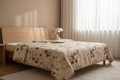 Prima Cherry Blossom Comforter draped on a bed in a cozy bedroom